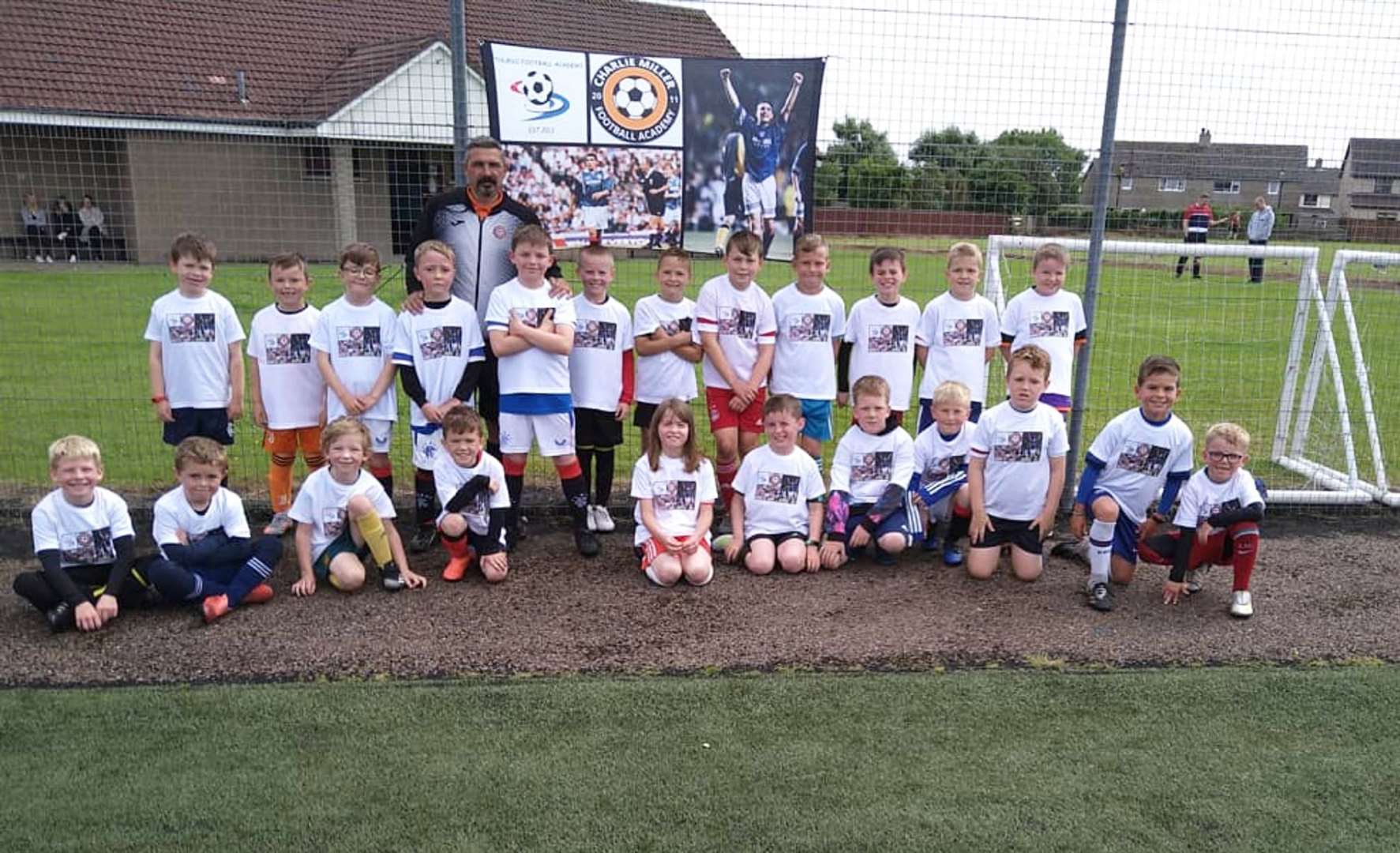 Children in the 7-9 age group with Charlie Miller during the training camp at Thurso's Naver pitch.