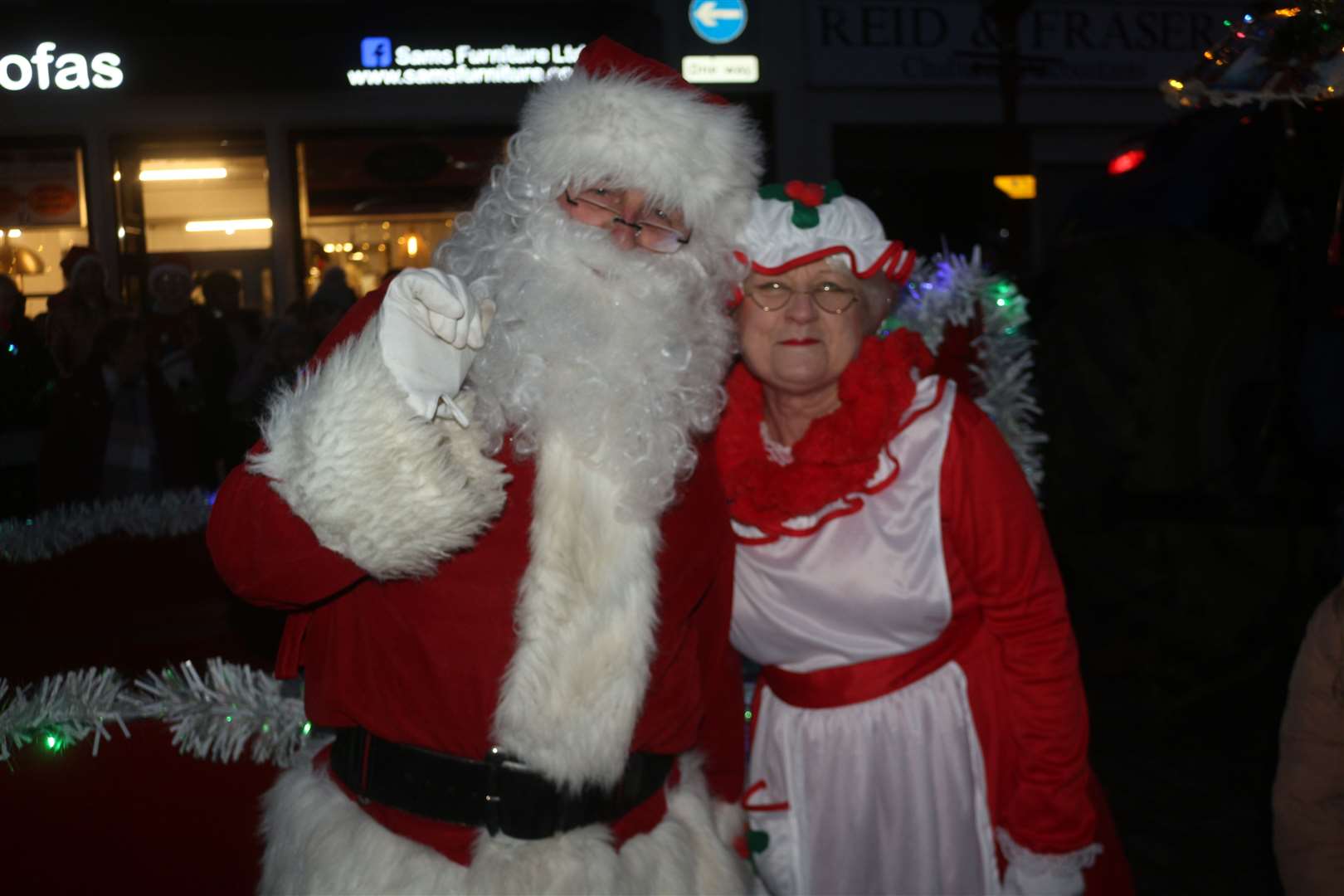 Santa and his helper, Mrs Claus, pose for the camera. Picture Eswyl Fell