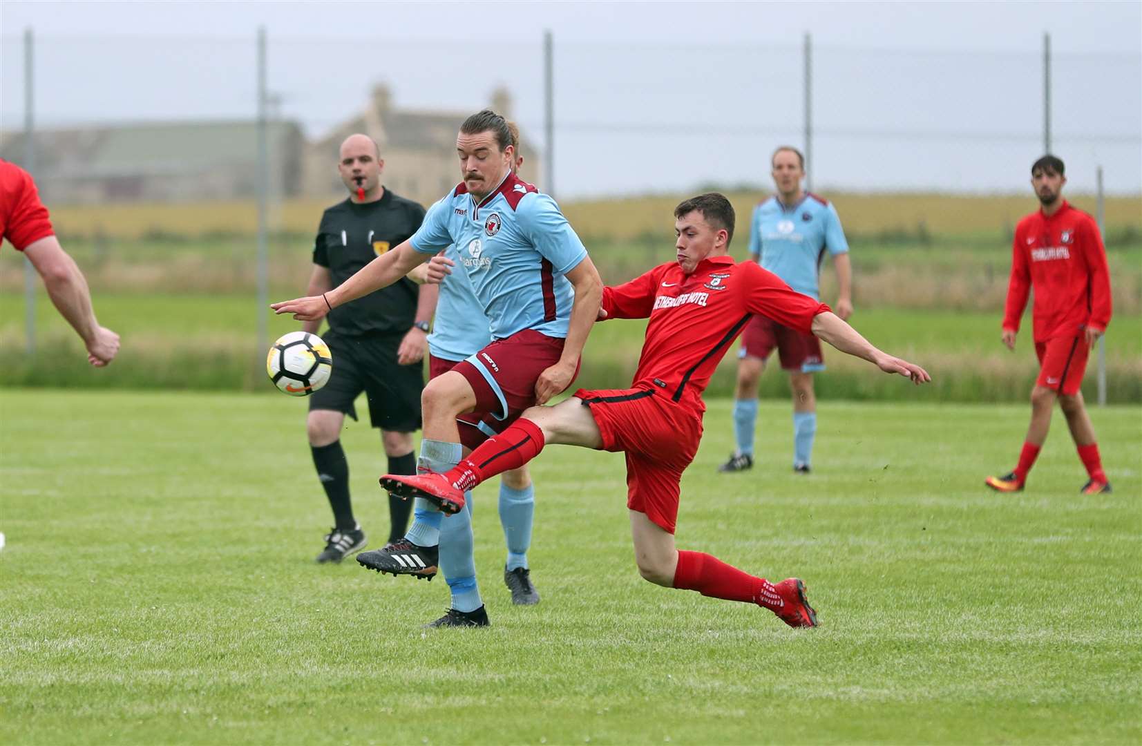 Ryan Campbell of Wick Groats tackles Pentland United's James McLean during last week's county league top-of-the-table fixture at Ham Park which Groats won 3-1. The teams meet again on Saturday in the last four of the Highland Amateur Cup. Picture: James Gunn
