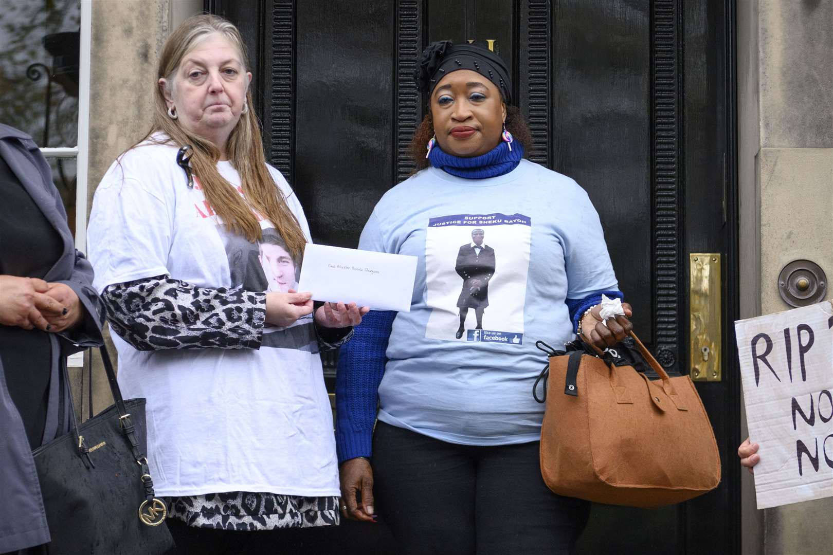 Allan Marshall’s aunt Sharon MacFadyen (left) delivering a letter to Bute House last year with fellow campaigner Kosna Bayoh, sister of Sheku Bayoh, who died after being restrained by police (John Linton/PA)