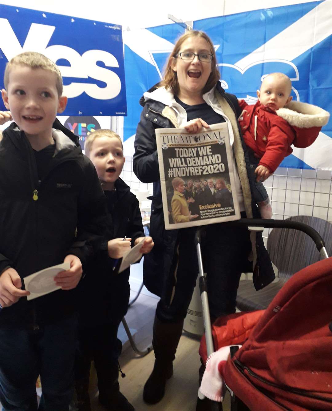 Ann Thompson and her young family in the Yes Caithness pop-up shop in Thurso.