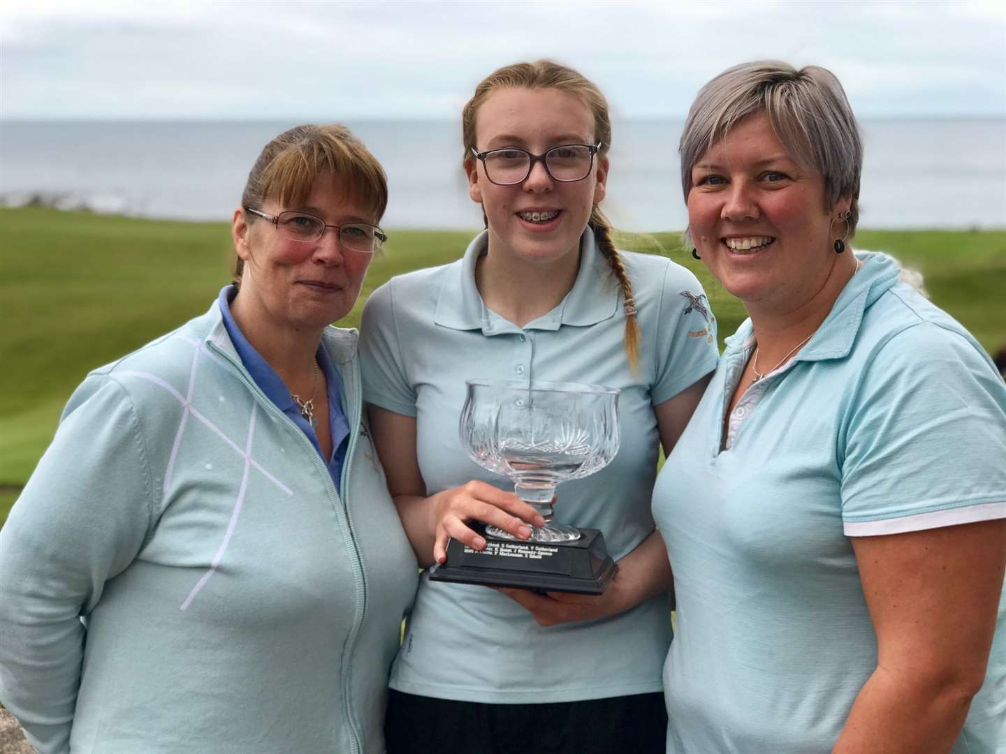 From left: Laura, Emma and Jean after their win at Brora.