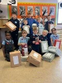 Children from Bower Primary with their shoeboxes for the Blythswood appeal.