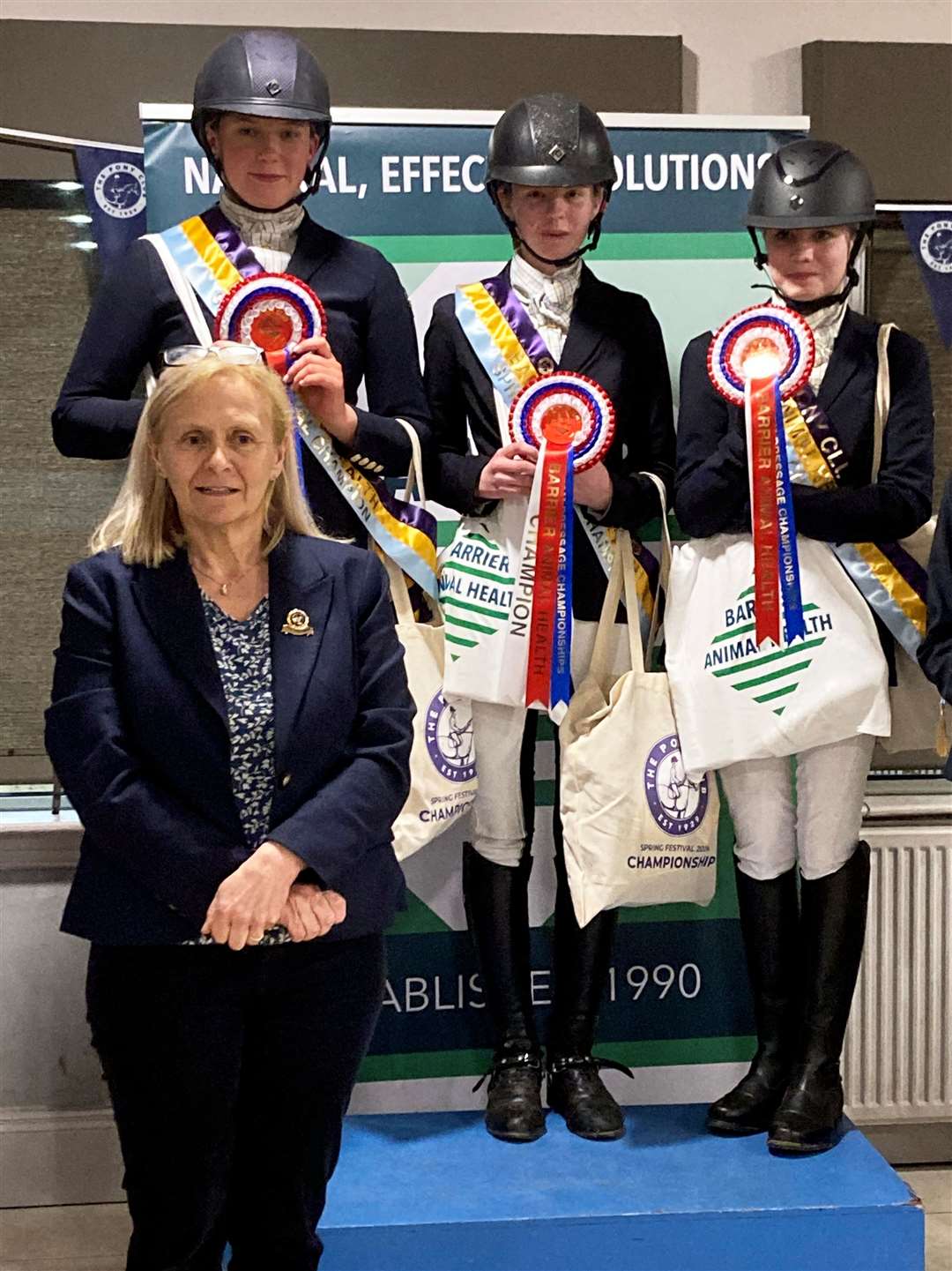 Caithness dressage winners with Di Pegrum, vice-chairperson of the Pony Club.