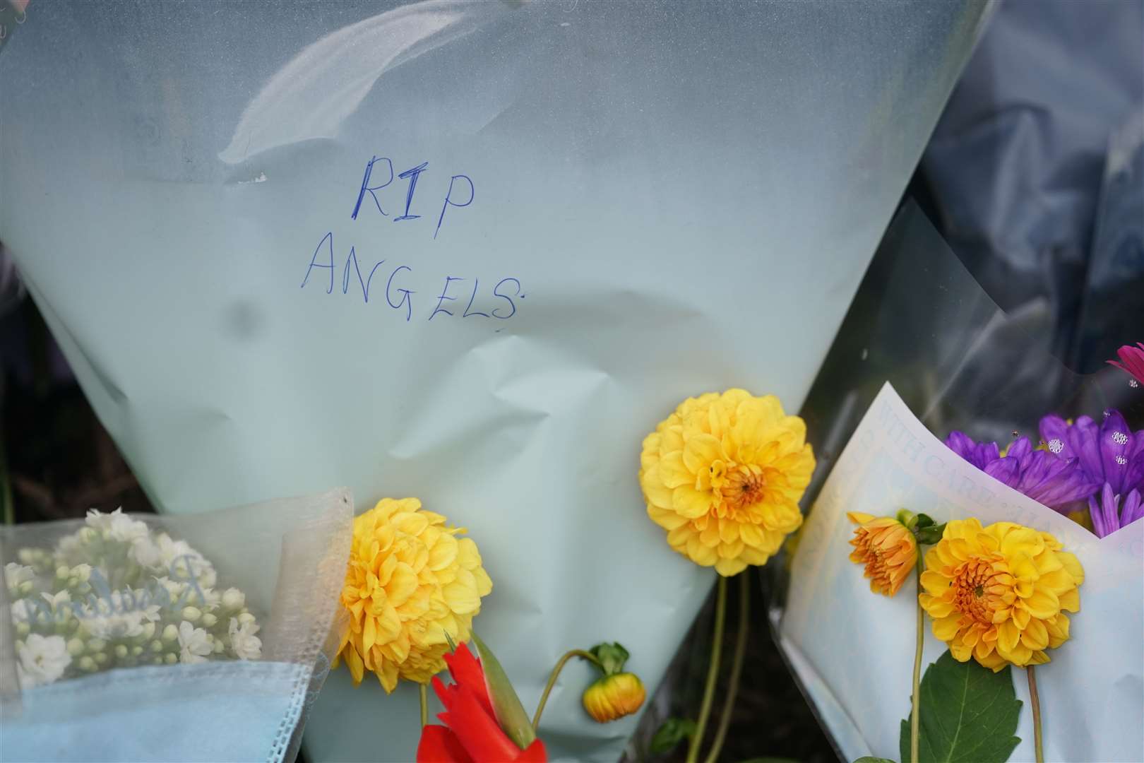 Flowers and tributes left at the scene (Brian Lawless/PA)