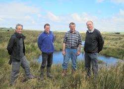 Lloyd Austin, RSPB head of conservation policy, Russell and Will Mill, farmers at Forsie, and local MSP Rob Gibson beside managed wetland grazing and pools attractive to waders.