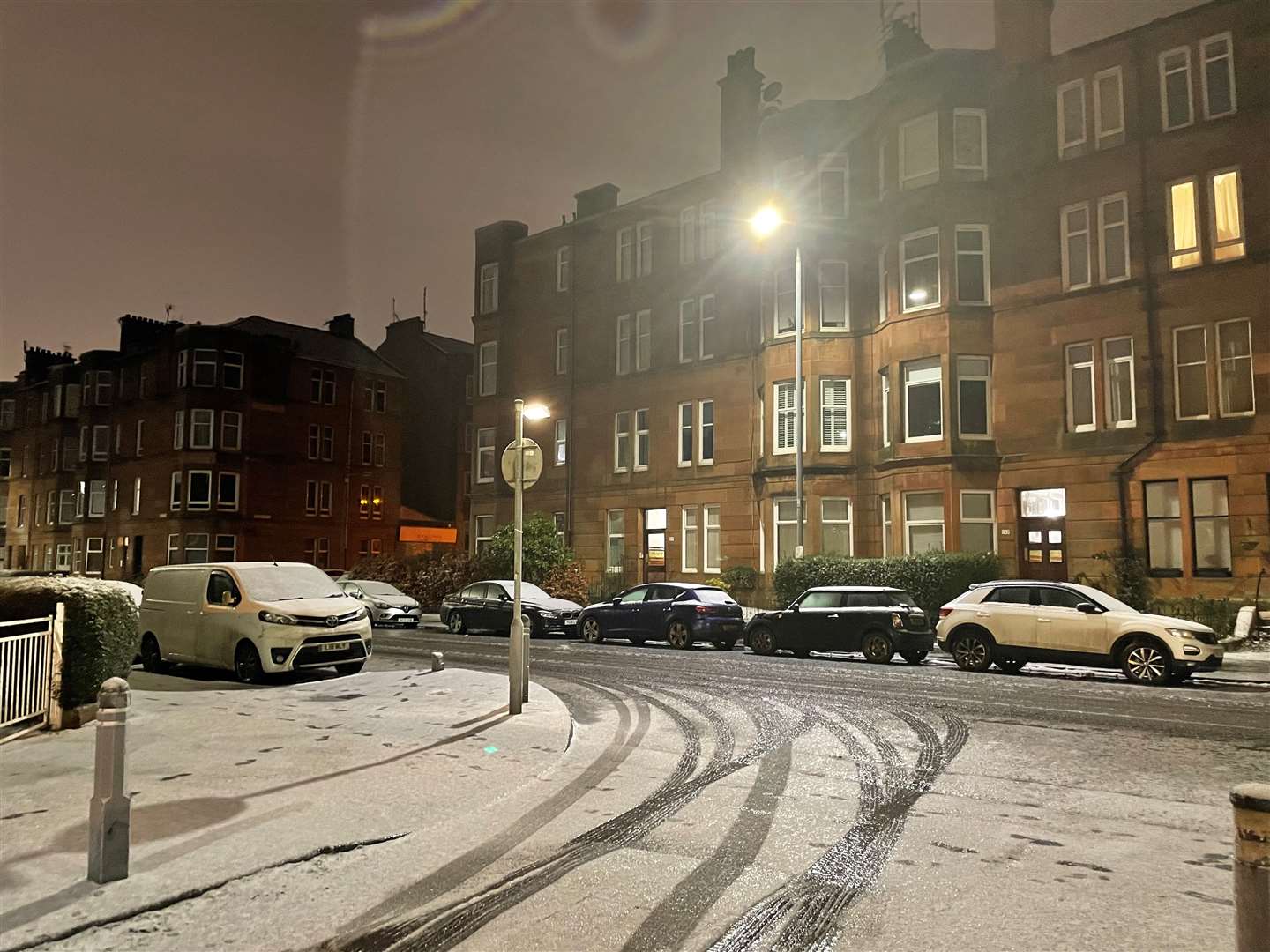 Snow covers the cars and roads in a residential area of Glasgow (PA)