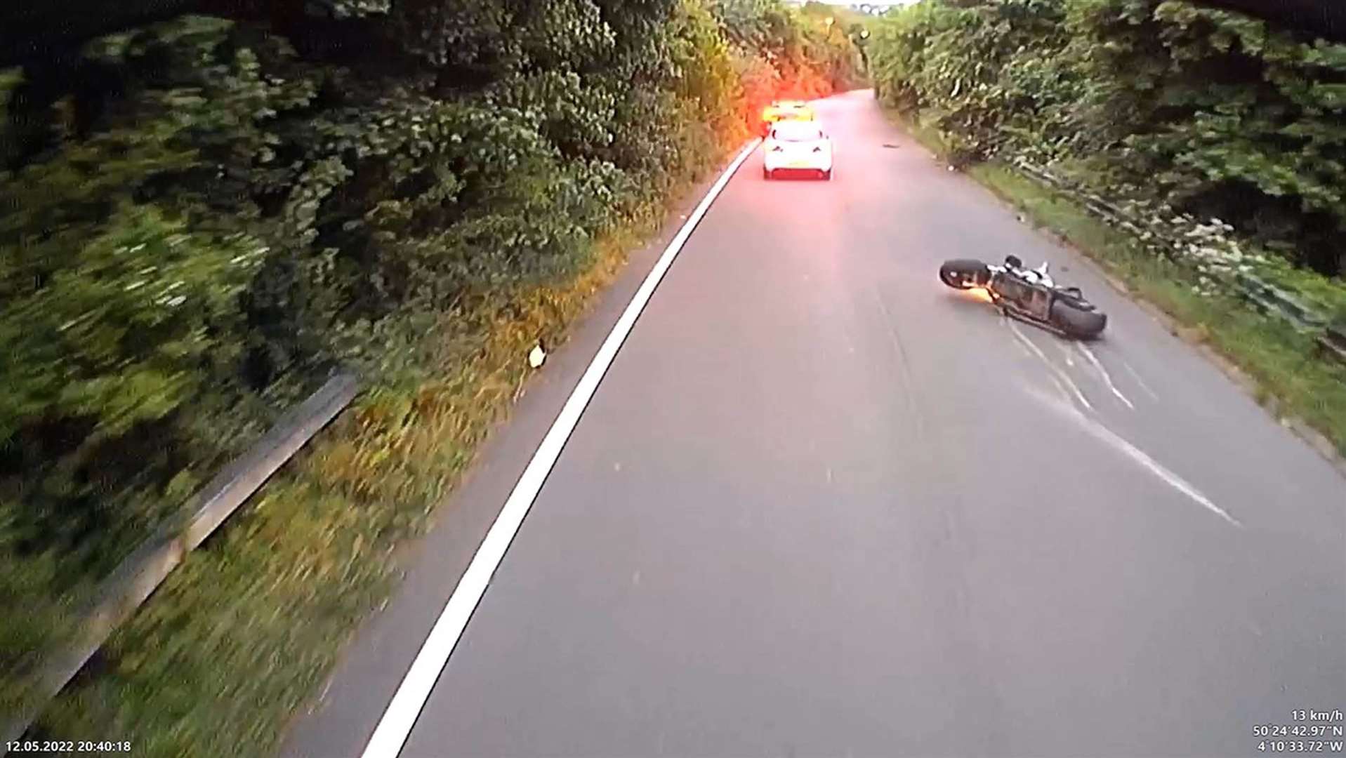 Dashcam footage of David Crawford’s bike after it was hit by a Ford Transit van (Devon and Cornwall Police/PA)