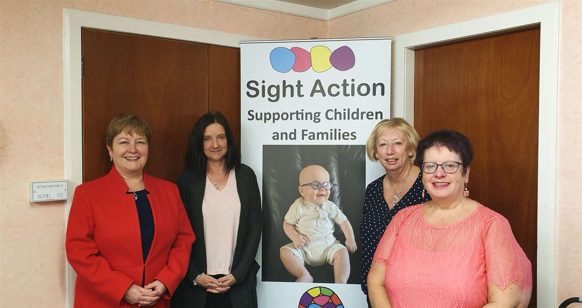 Rhoda Grant (left) with some of the Sight Action team.