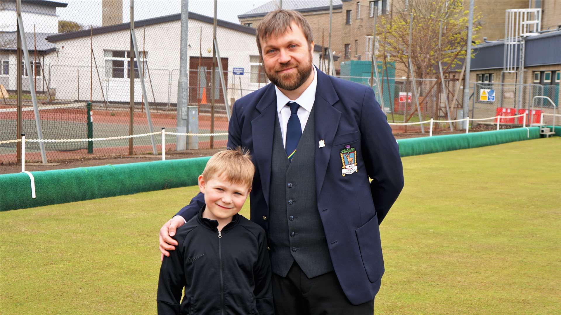 Oscar with his dad, Mark Banks who is vice president of the Rosebank Bowling Club. Picture: DGS