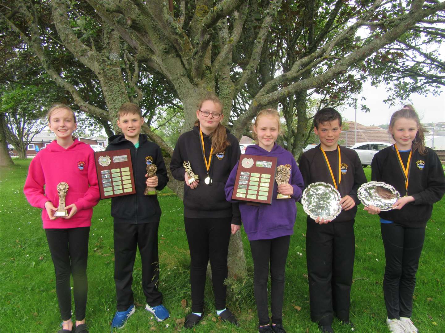 From left: Geena Hossack – most improved, football; Bruin Gunn – player of the year, football; Chloe Duffy – most improved, netball; Isla Mackay – player of the year, netball; Tom Armitage – boys’ sports champion; Kelsey Norquoy – girls’ sports champion.