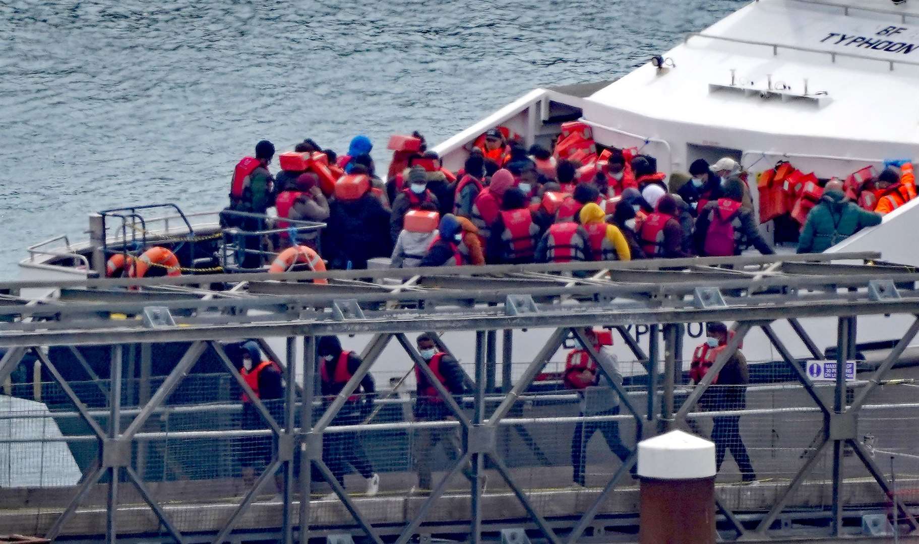 A group of people thought to be migrants are brought in to Dover, Kent, after being rescued by a Border Force vessel following a small boat incident in the Channel in May (Gareth Fuller/PA)