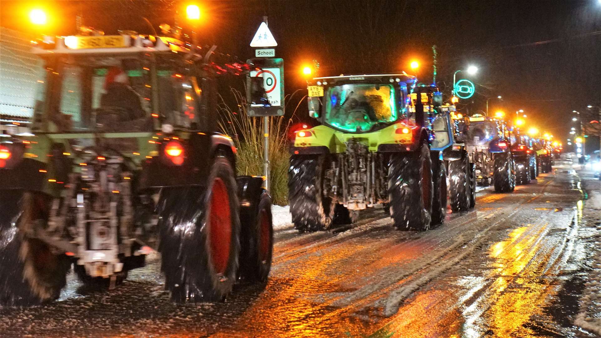 Young Farmers centenary tractor run travels through Watten on its way to Thurso from Bower. Picture: DGS