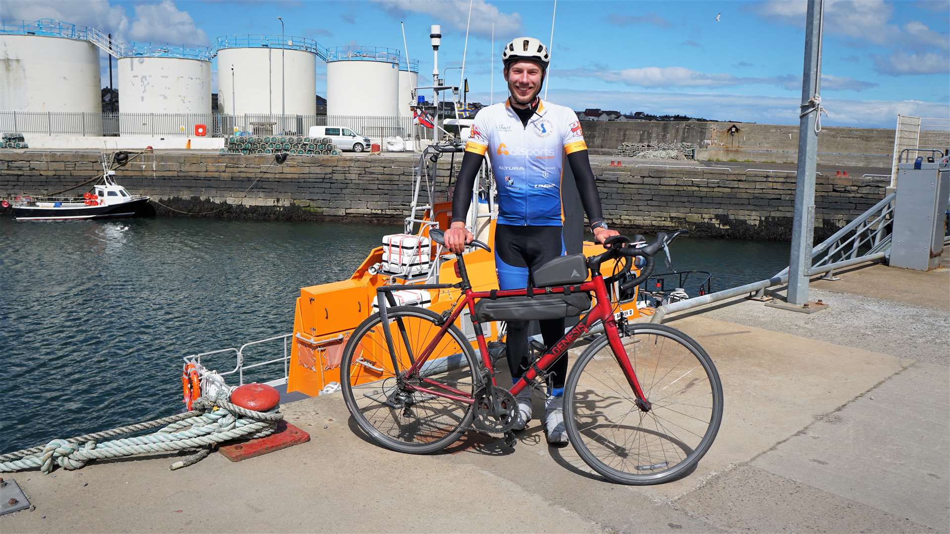 Harry Lidgley beside the Wick lifeboat on Saturday morning. Harry has now visited 86 lifeboat stations on the fundraising journey, cycling 3775km. Pictures: DGS