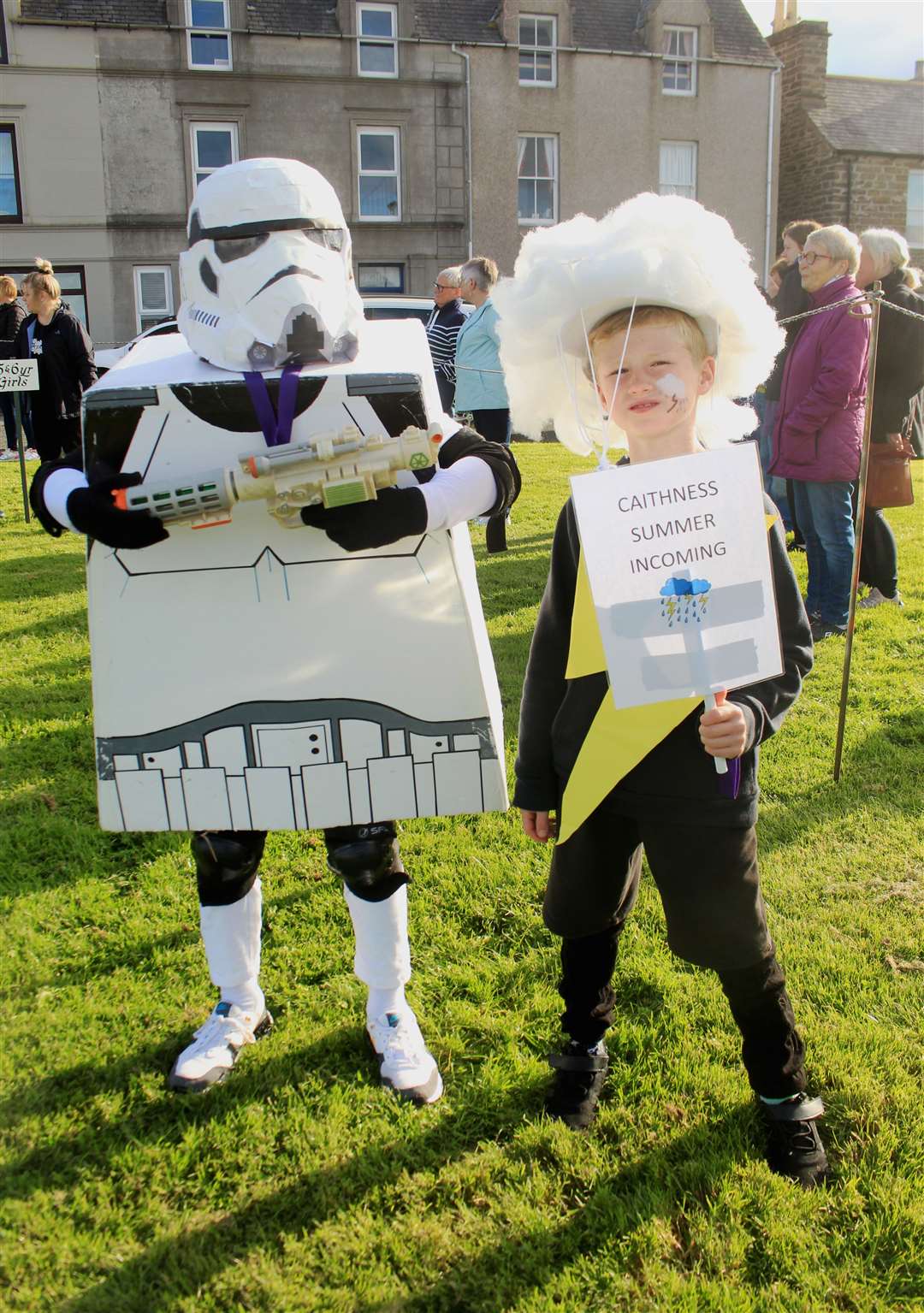 Lego Stormtrooper Caalin Rosie (9) with Myles Oliphant (8), who was dressed as a thunder cloud to represent Wick's unpredictable weather. Picture: Alan Hendry