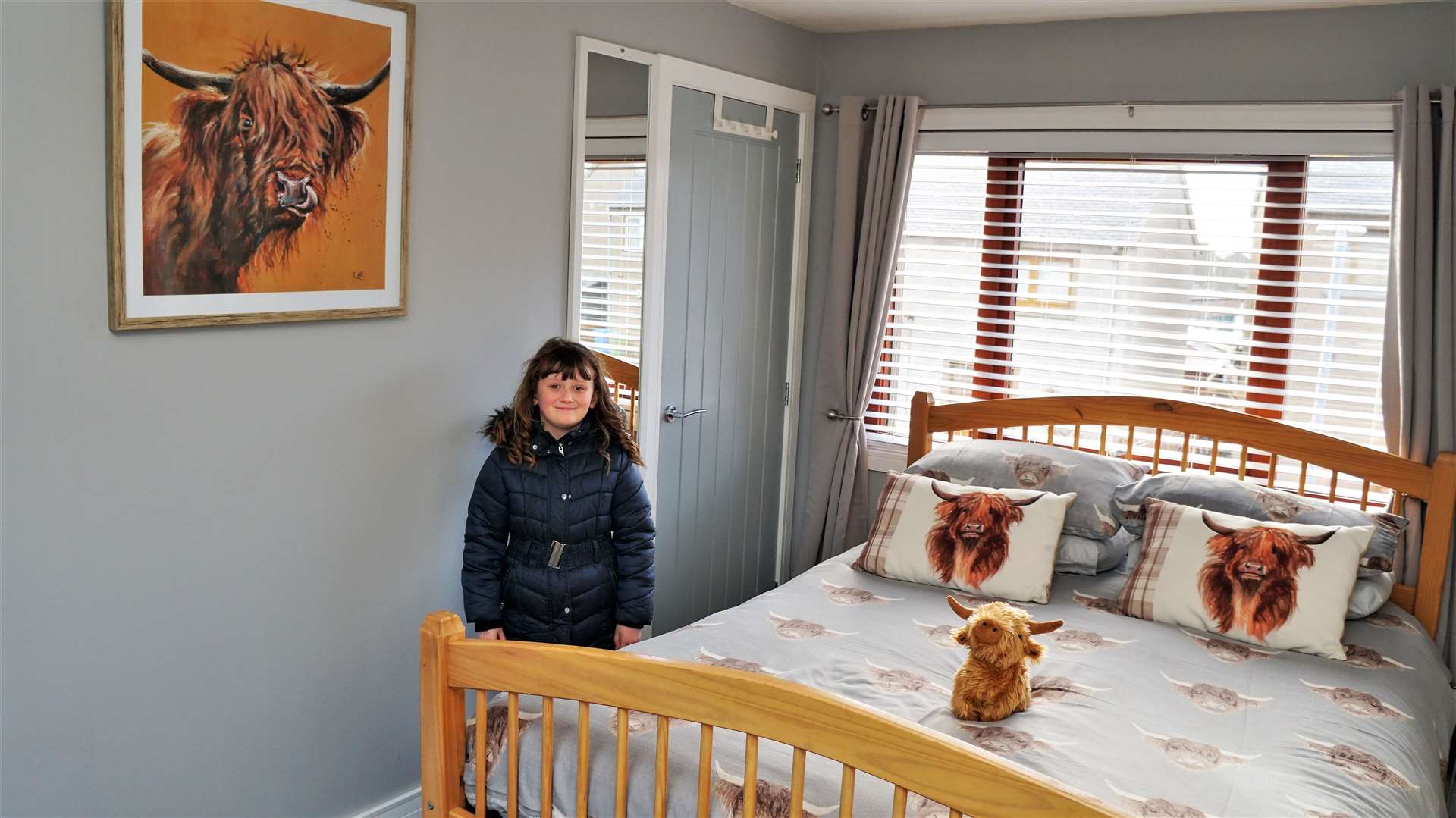 Ella likes Highland cows so wanted a bedroom of her rental property decorated with them. Picture: DGS