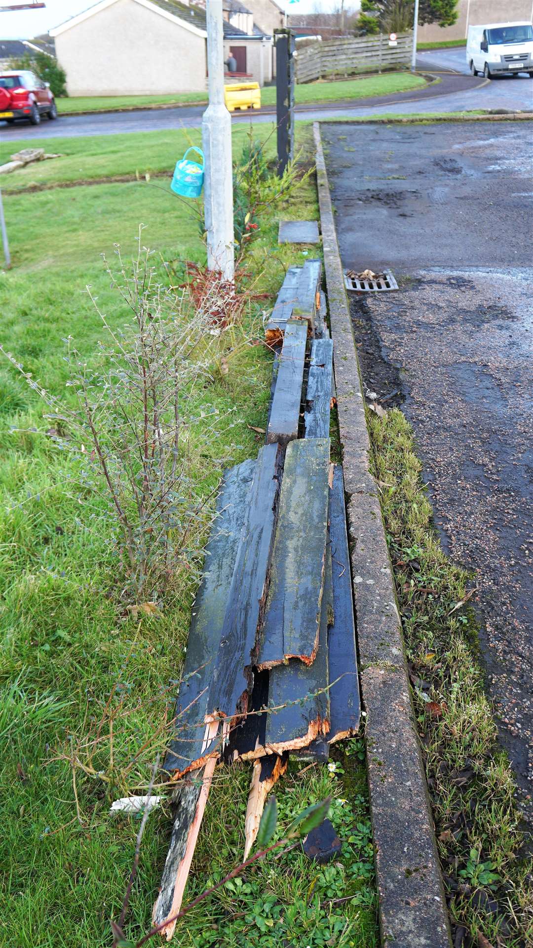 Broken pieces of the fence have lain rotting by the roadside for a number of years.