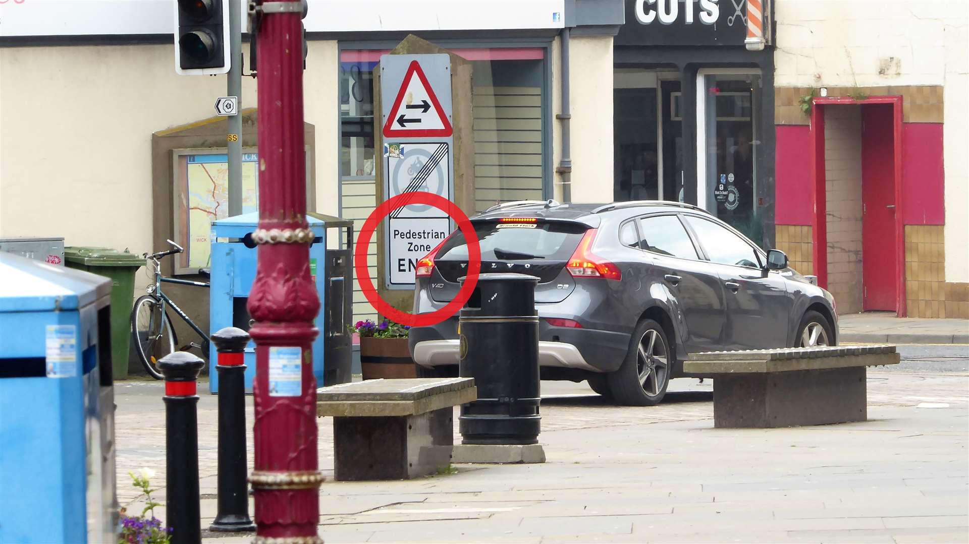 A driver sits at the traffic lights at the end of the route which is clearly marked with vehicle restrictions. Pictures: DGS