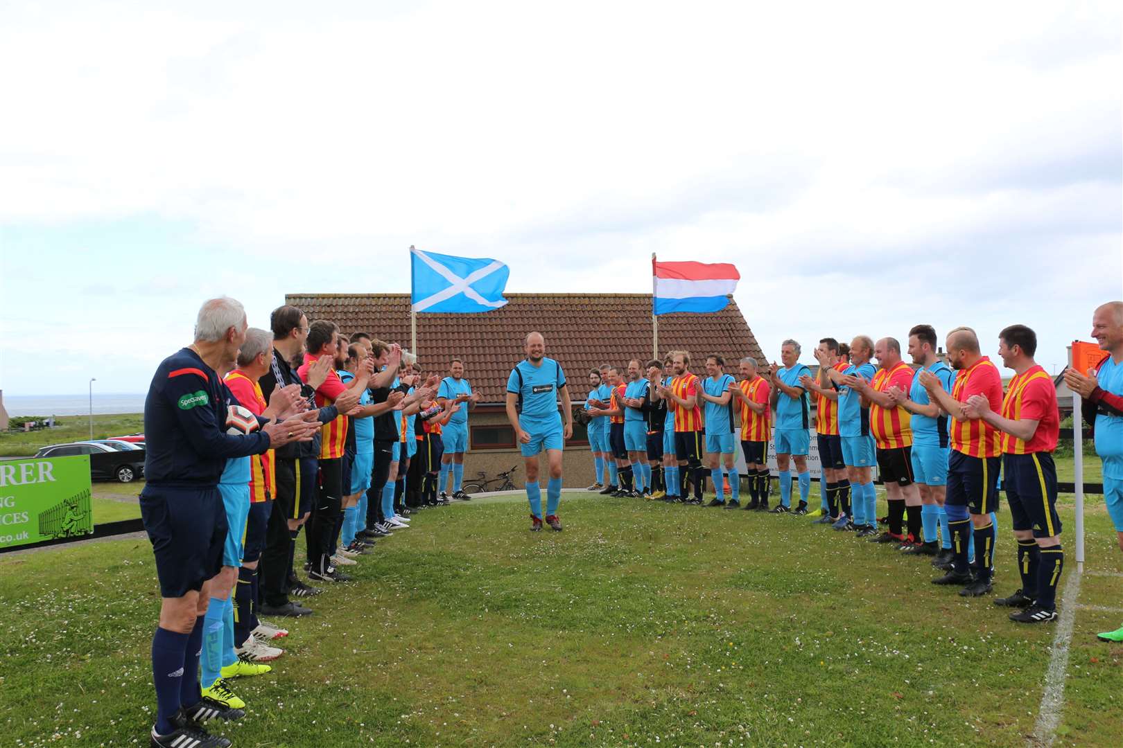 A guard of honour at Folke Park for Gijs van der Poel after his groundhopping trek from Land's End to John O'Groats.