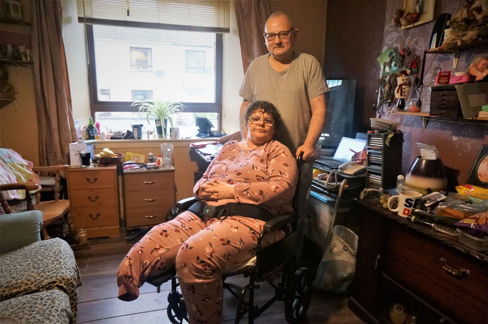 Janet with her partner Ronnie at home in West Banks Terrace in Wick. Janet is confined indoors most of the time and rarely gets out. Picture: DGS