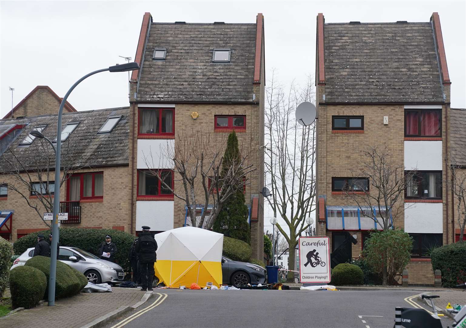 Police at the scene near Bywater Place in Surrey Quays, south-east London (Lucy North/PA)