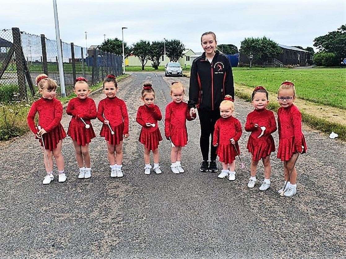 The youngest members of Marrellian Majorettes, with coach Susie Lyall, during the virtual gala parade held last year.