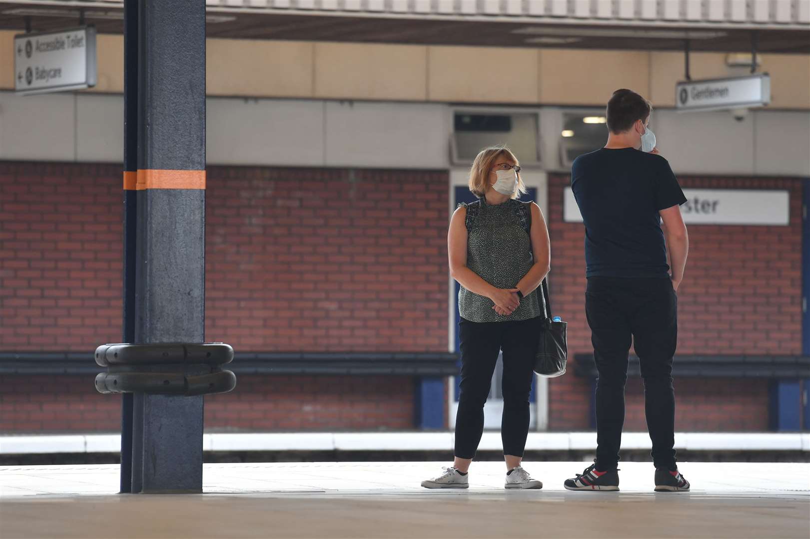 People wearing masks at Leicester railway station (Jacob King/PA)