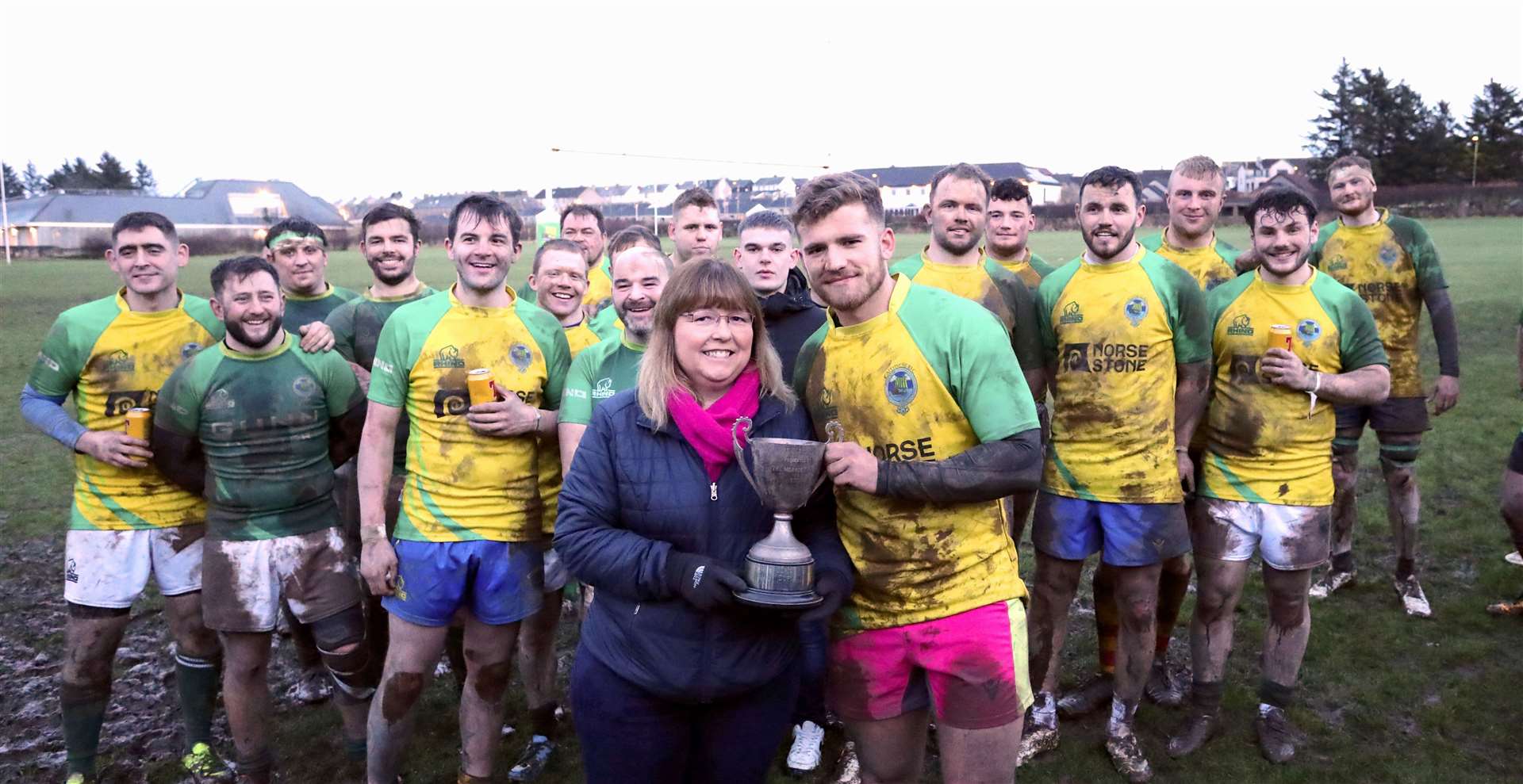Shona Kirk presents the Sinclair Cadzow Memorial cup to her son Stuart, captain of the Exiles. Picture: James Gunn