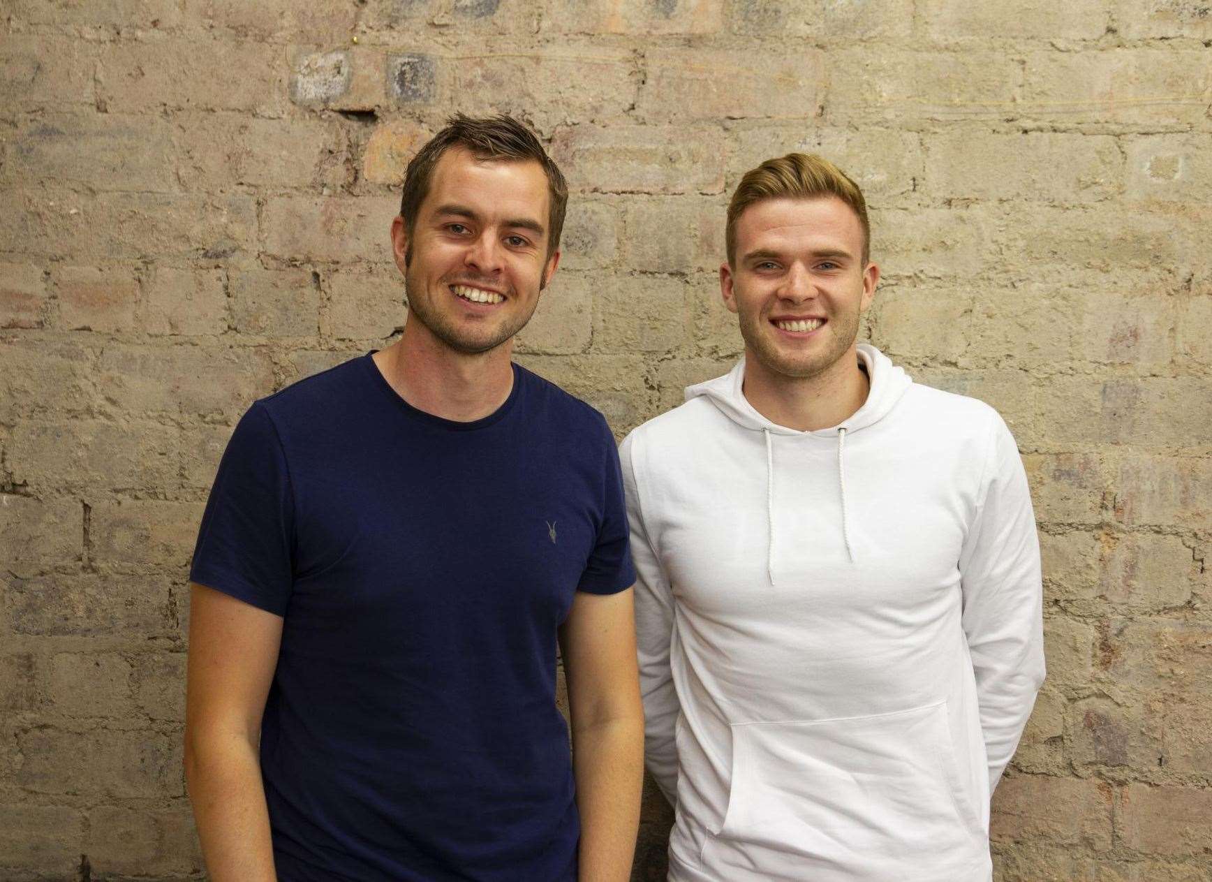 John Johnstone (left) with one of his clients, Chris Cadden of Hibs. Picture: Football Mindset