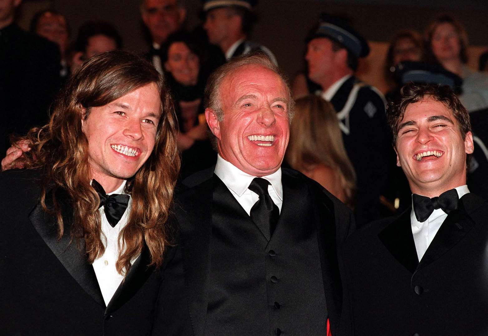 James Caan, centre, with Mark Wahlberg, left, and Joaquin Phoenix (Toby Melville/PA)