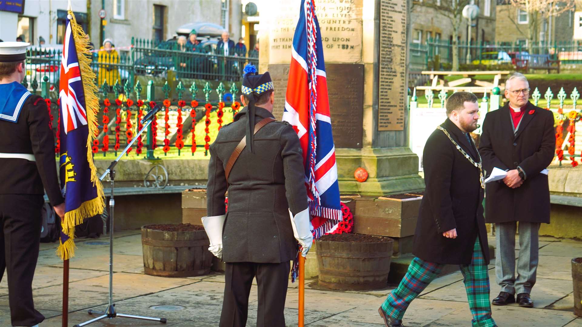Thurso provost Struan Mackie walks back after laying a wreath on behalf of the council. Picture: DGS