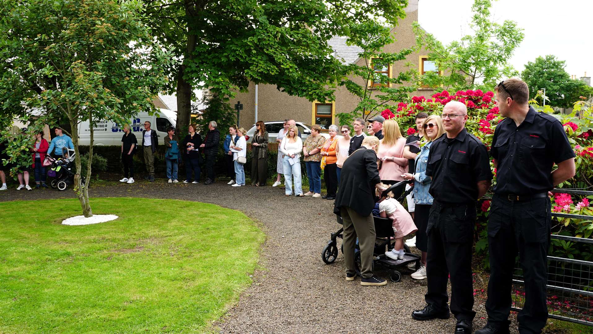 Two members of the Dounreay fire service who were involved in the laying of slabs at the garden were among many who attended the event. Picture: DGS