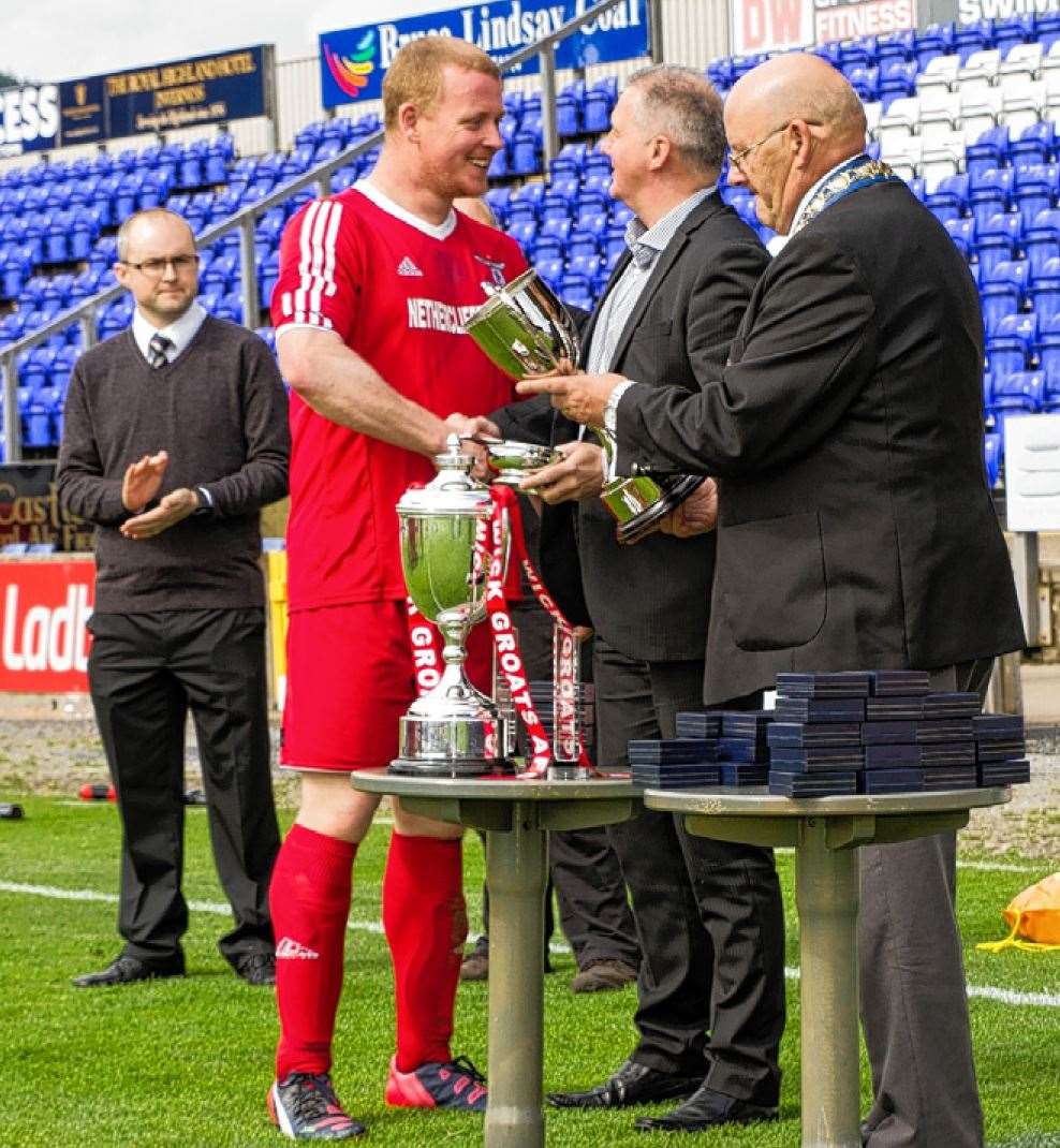 Alan Sinclair receivces his man-of-the-match award after the 2015 Highland Amateur Cup final, when Wick Groats beat Avoch 3-1 after extra time. Picture: Donald Cameron