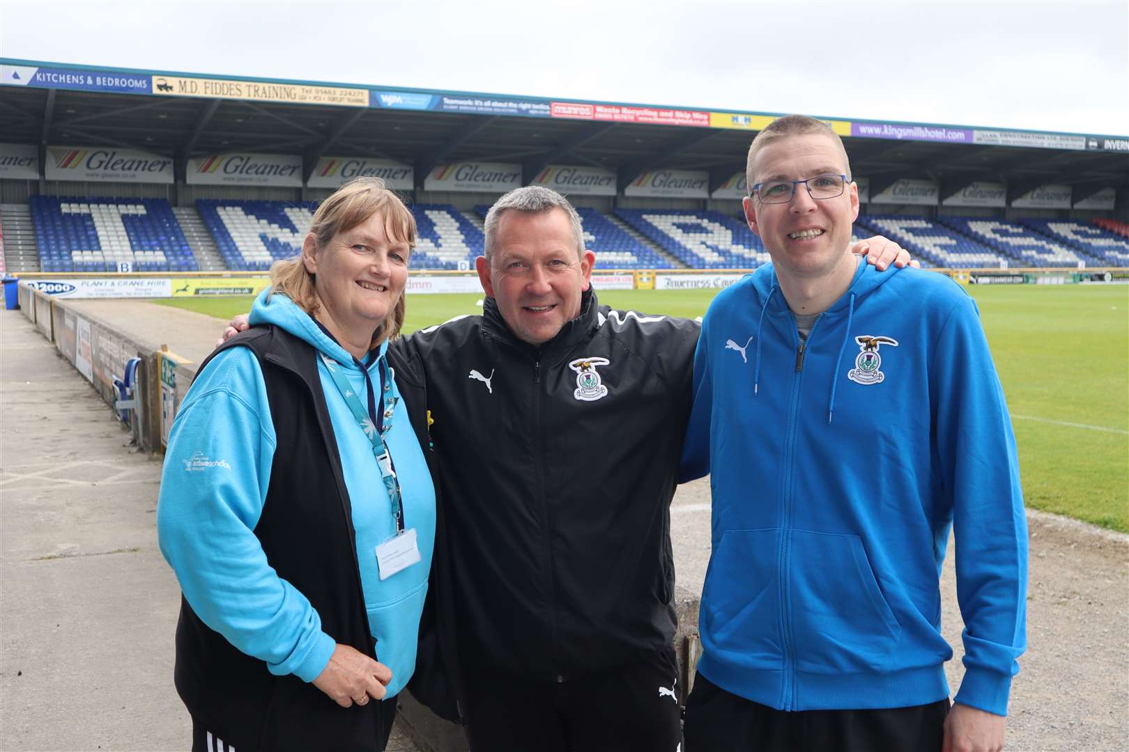 Caley Thistle head coach Billy Dodds with Elizabeth McDonald, who runs High Life Highland's leadership scheme, and Alyn Gunn of Thurso Football Academy.