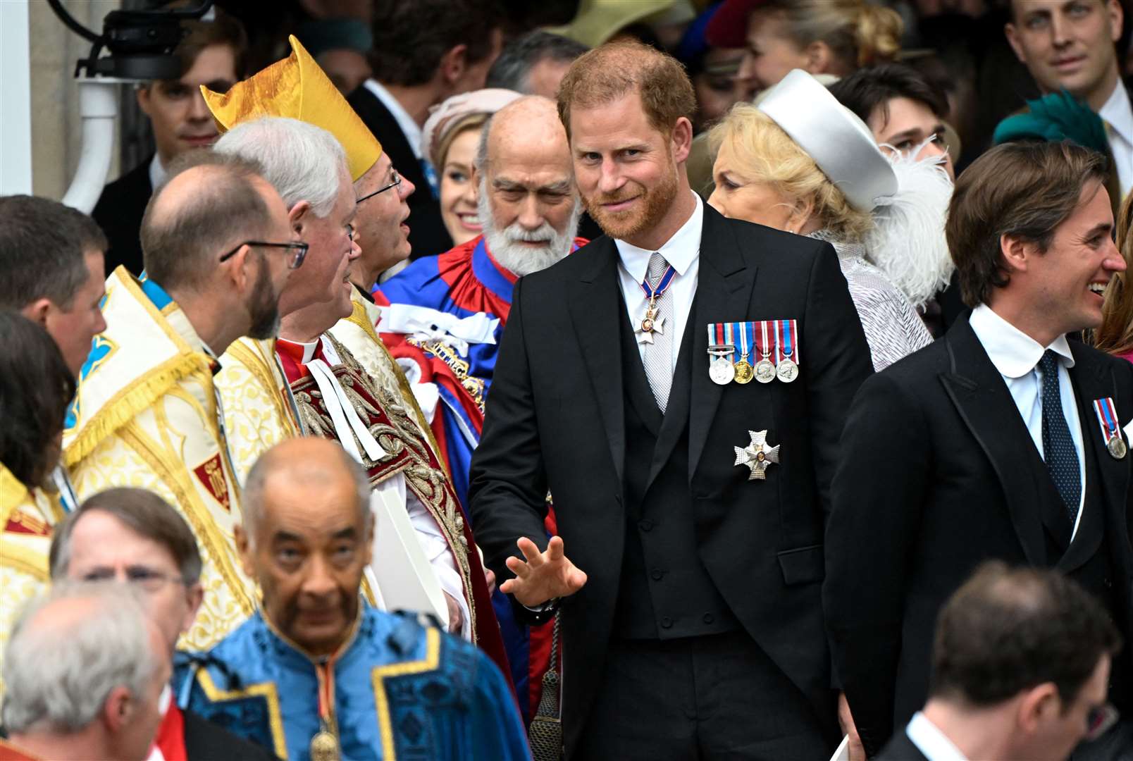 The Duke of Sussex leaves Westminster Abbey after the coronation (Toby Melville/PA)
