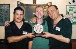 PDC World Champion Gary Anderson (left) with fellow pro Gary Robson (right) and Francis Street Club darts player John Burns in Wick in 2006.