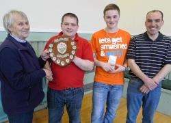 Watten Bowling Club secretary Jennifer Sutherland (left) presents the Peter Knowles Shield to the new under-25 county champion Tam Mulraine with runner-up Peter Dymond and competition umpire Liam Swanson, Watten.
