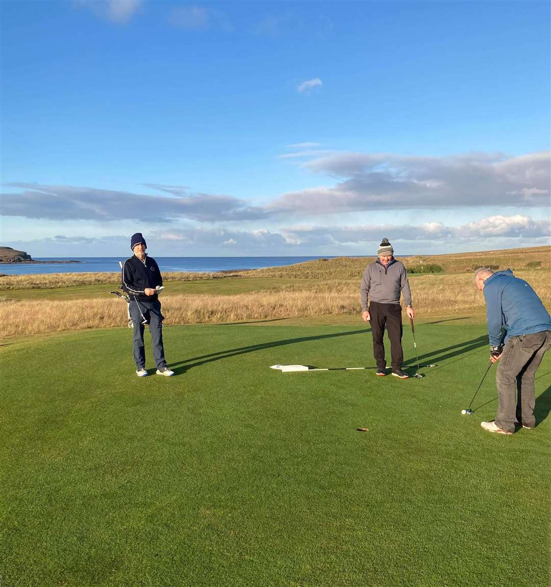 Bruce Mackay, winner of the latest round of Reay Golf Club's Winter League Stableford, putting on the eighth green.