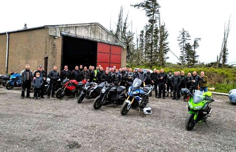 The group congregate at Thrumster Garage.