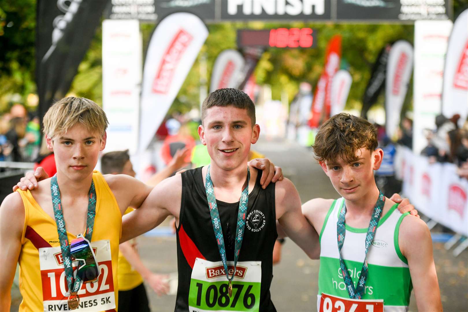 Billy Sutherland (centre) claimed victory at the River Ness 5k. Ruairidh Stirling of Inverness Harriers (left) was second in 16:37 with Archie Dalgliesh Gala Harriers (right) taking third spot in 16:40. Picture: James Mackenzie