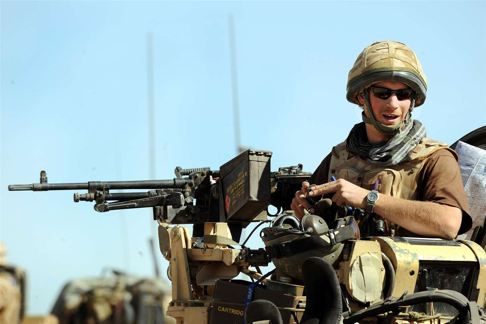 Prince Harry sitting in his position on a Spartan armoured vehicle in Helmand province (John Stillwell/PA)