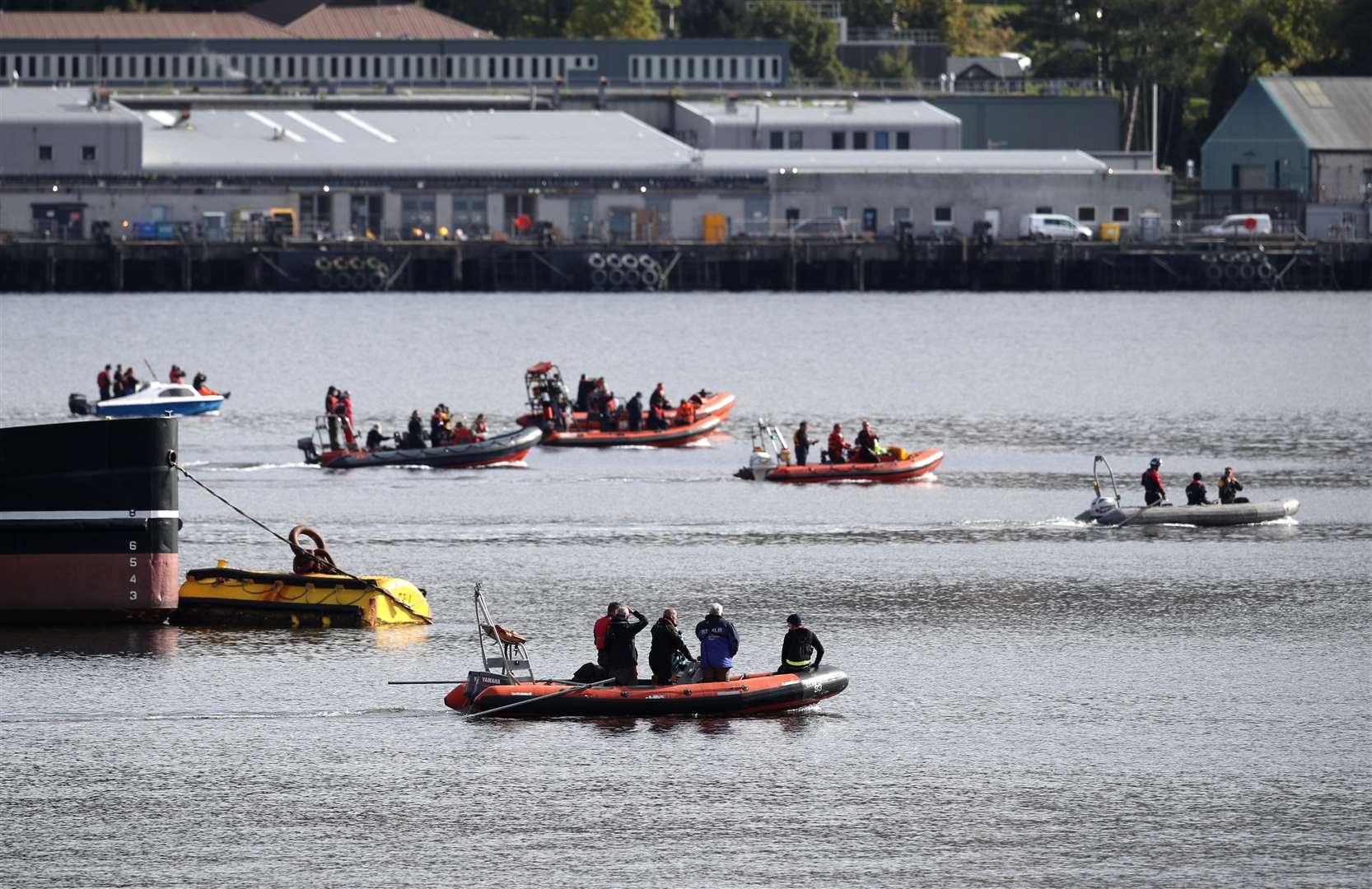 A number of boats are involved in the operation (Andrew Milligan/PA)