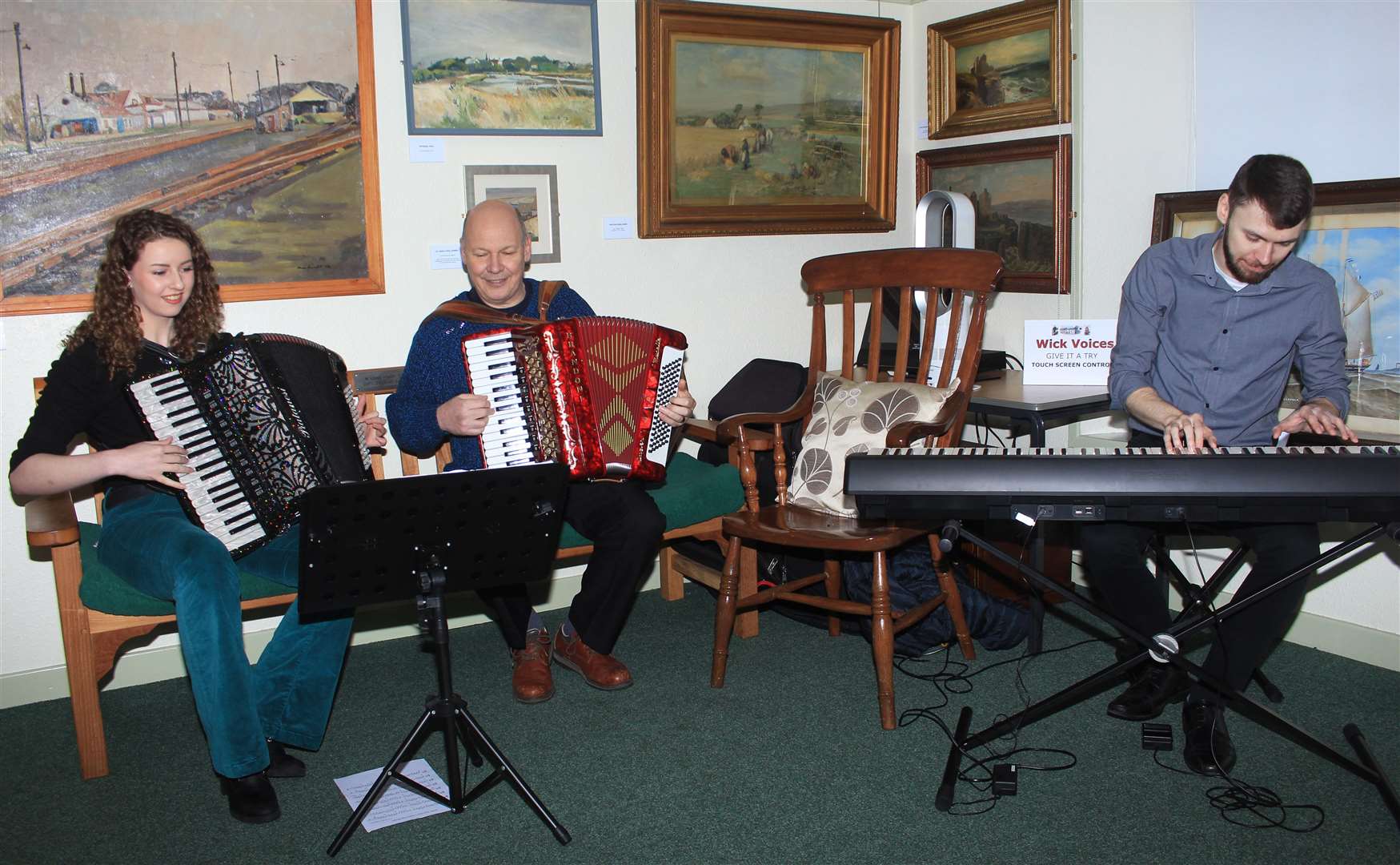 Musicians Joanne Sutherland, Addie Harper and Richard Smith performing during the event on Monday. Picture: Alan Hendry