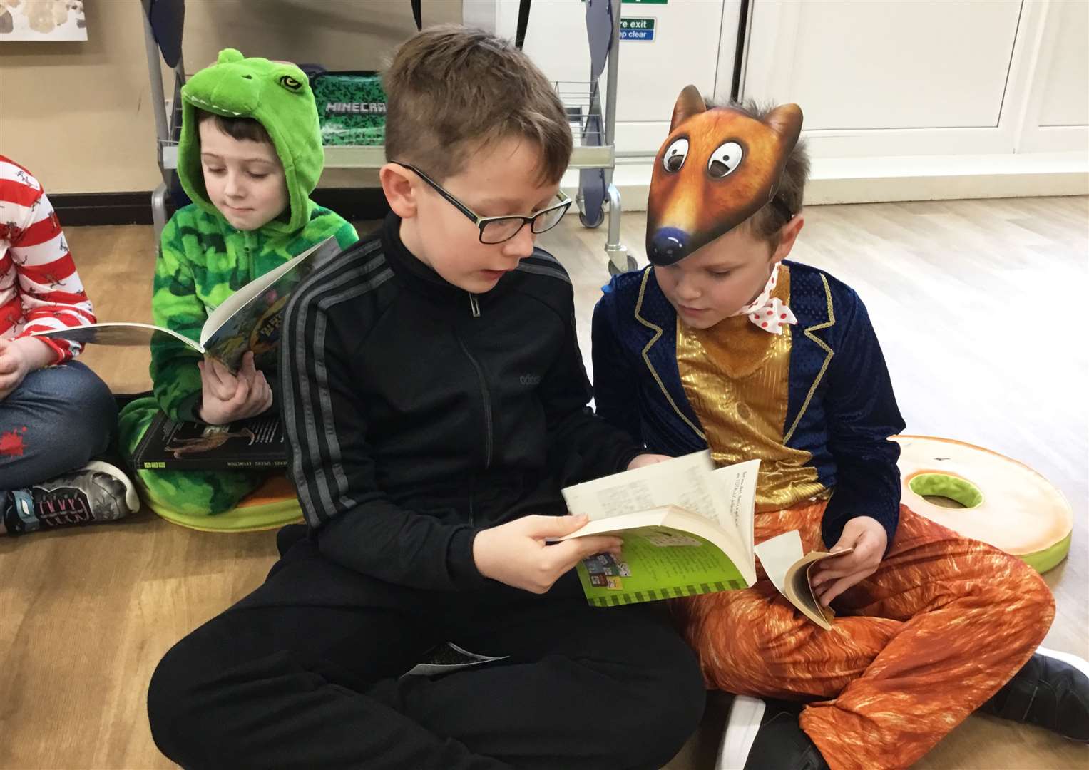 Reading buddies at Keiss absorbed in their books.