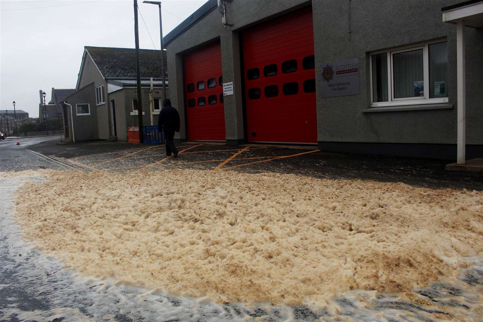 Foam washed up outside Wick fire station in Martha Terrace. Picture: Alan Hendry
