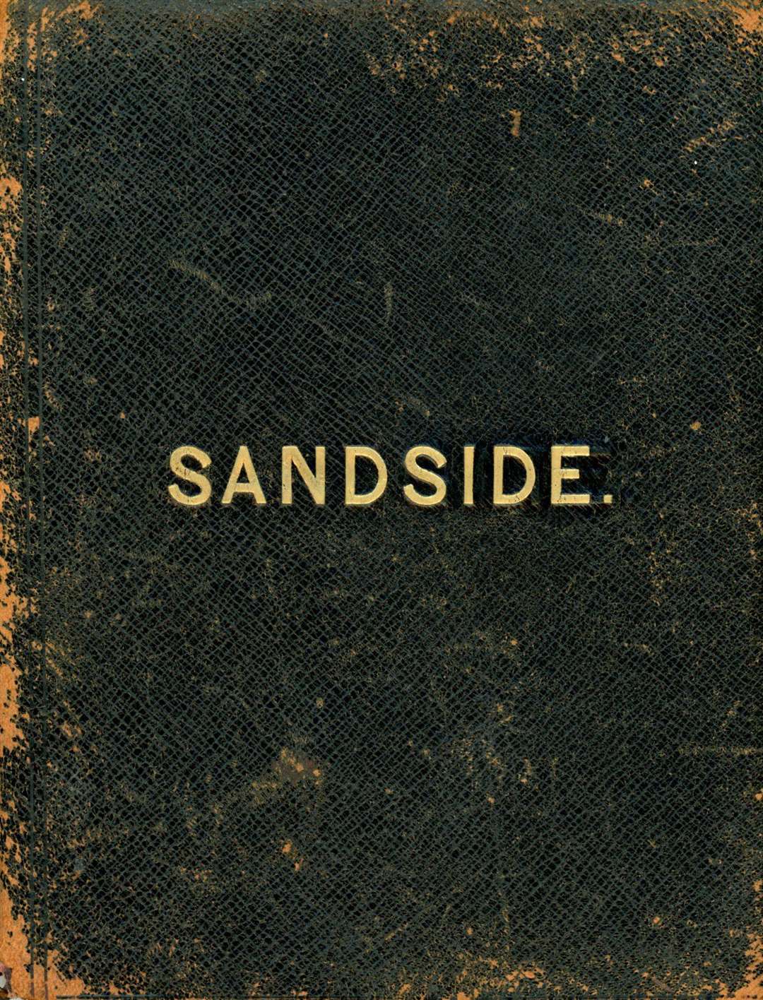 The scuffed leather folder which contains the Sandside Journal.