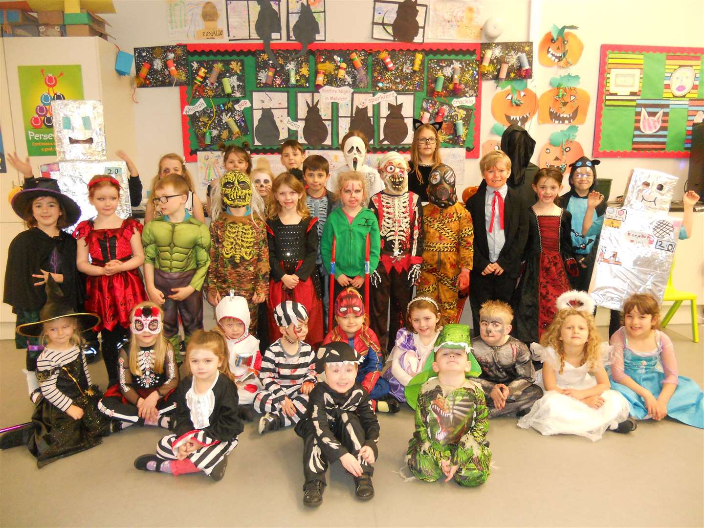 The nursery and primary youngsters dressed in their Halloween costumes.