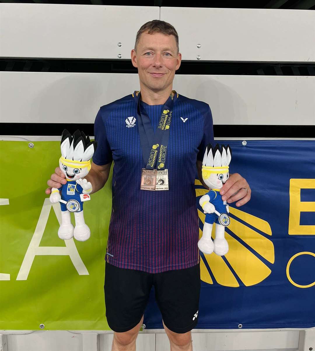 Mark Mackay with his silver and bronze medals at the European Senior Championships in Ljubljana.