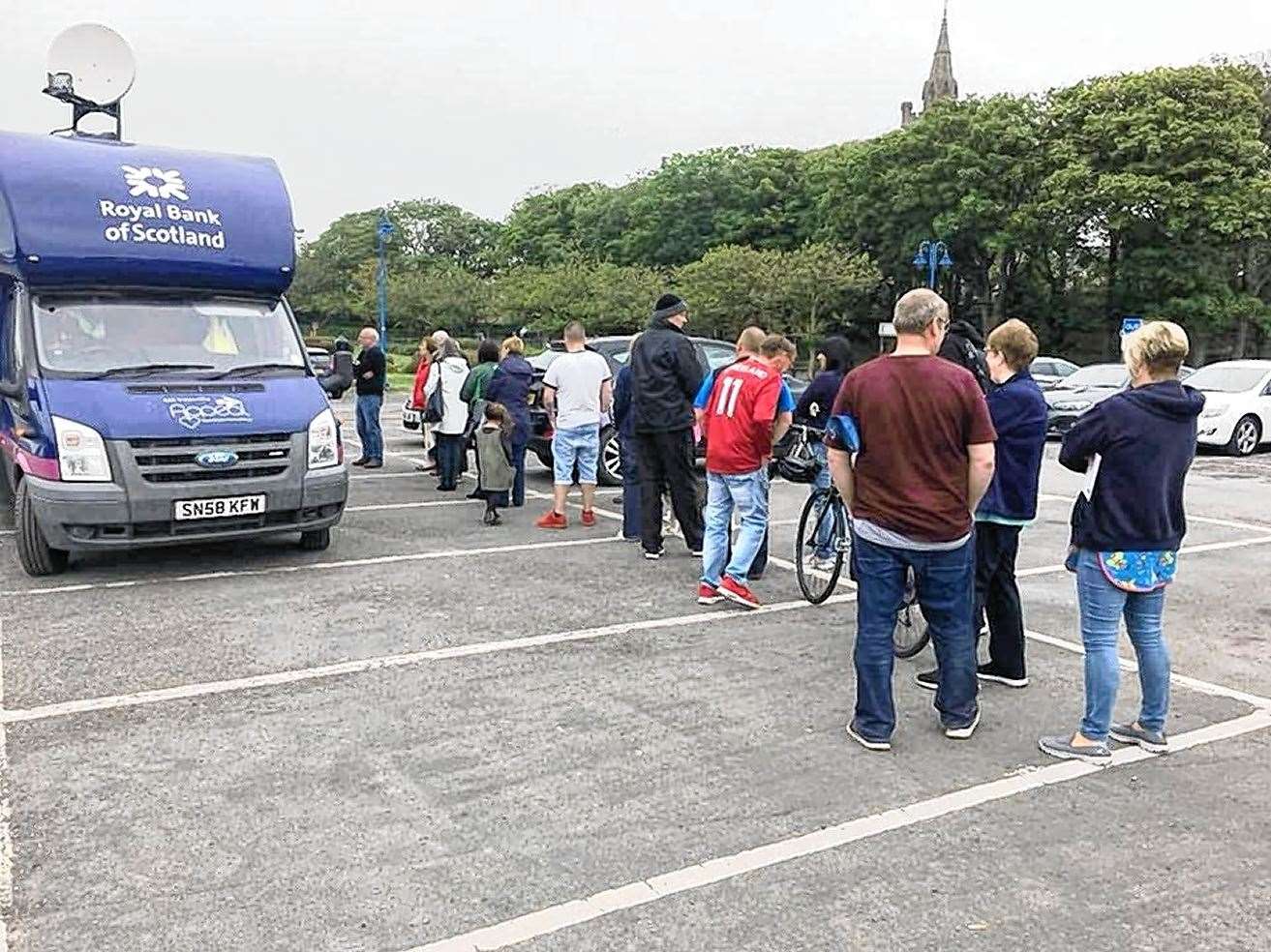 People queuing at the RBS mobile bank in Wick - a provision used by banks that Scottish Affairs Committee chair Pete Wishart MP describes as a ‘get out of jail free card’.