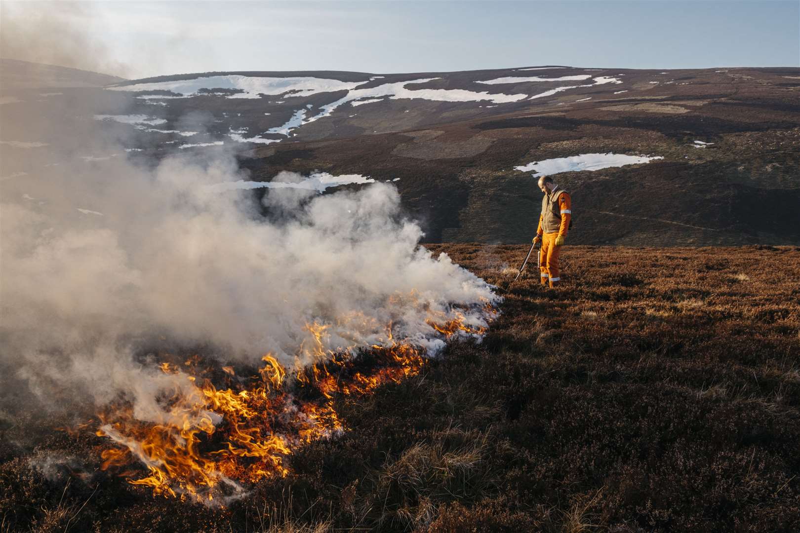 A gamekeeper using controlled fire.